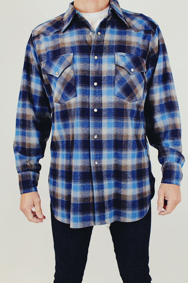 men's vintage long sleeve pendleton wool button up shirt in blue plaid with popper buttons