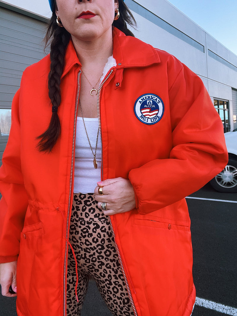 long sleeve bright orange zip up jacket with white fleece liner vintage