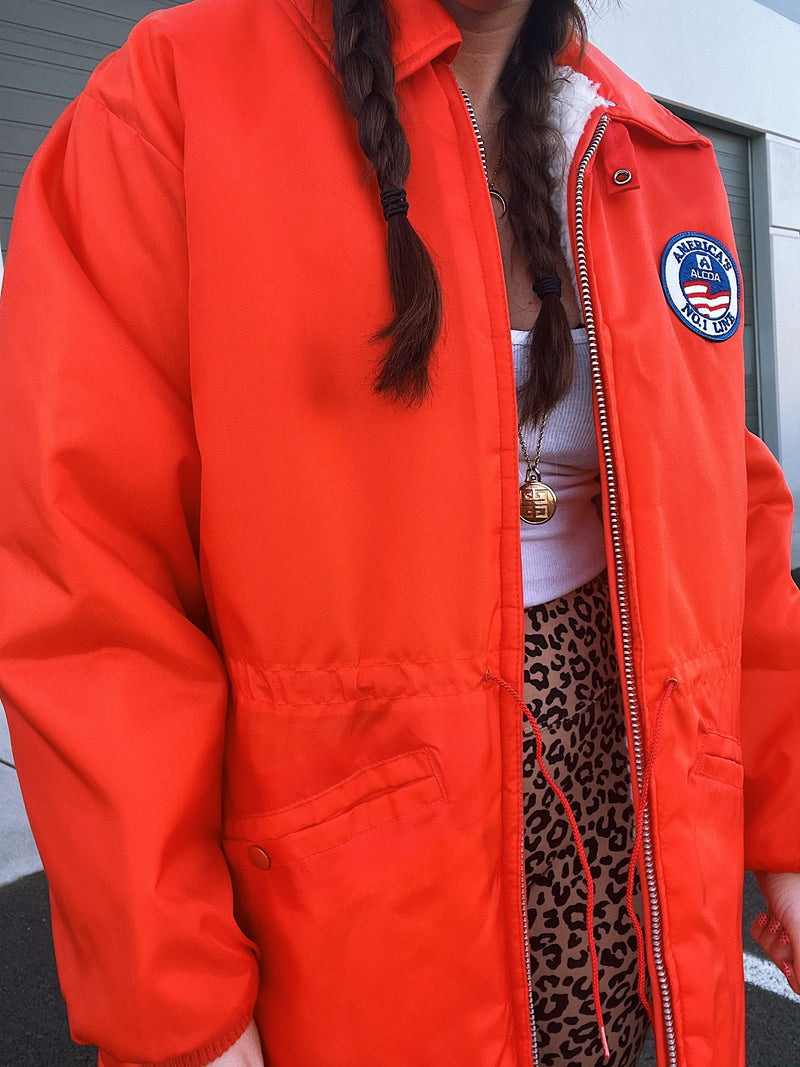 long sleeve bright orange zip up jacket with white fleece liner vintage