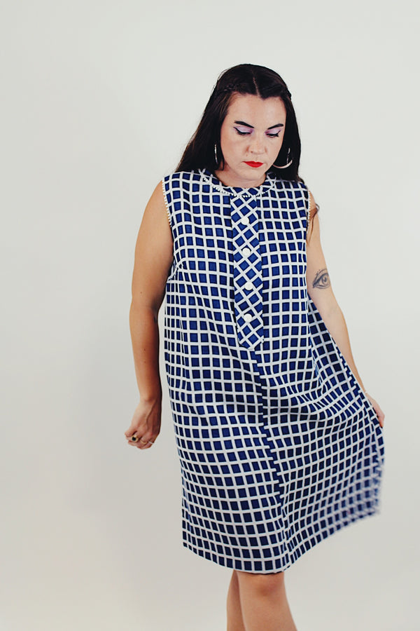 blue and white sleeveless shift dress