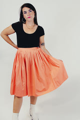 orange retro pleated midi skirt model