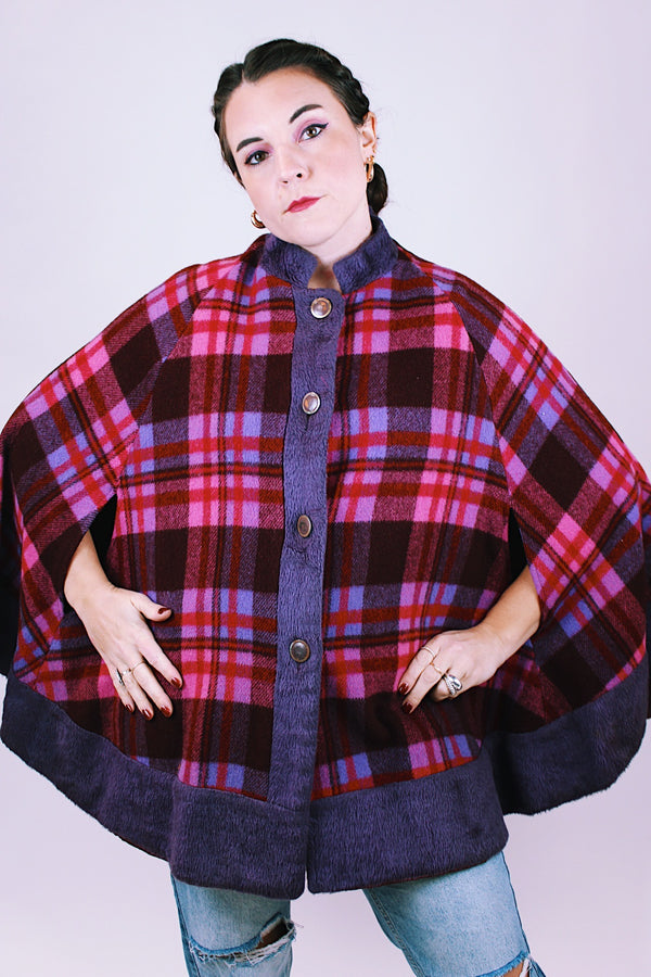 purple and pink plaid vintage women's poncho with mandarin collar, buttons, and armholes made of wool blend