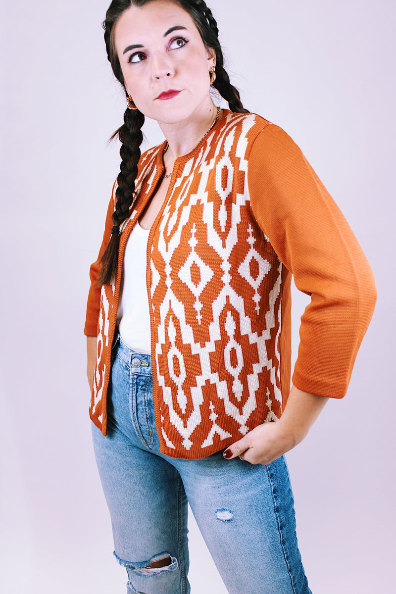 knitted open sweater women's vintage in burn orange with white aztec print