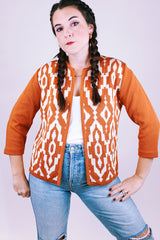 knitted open sweater women's vintage in burn orange with white aztec print