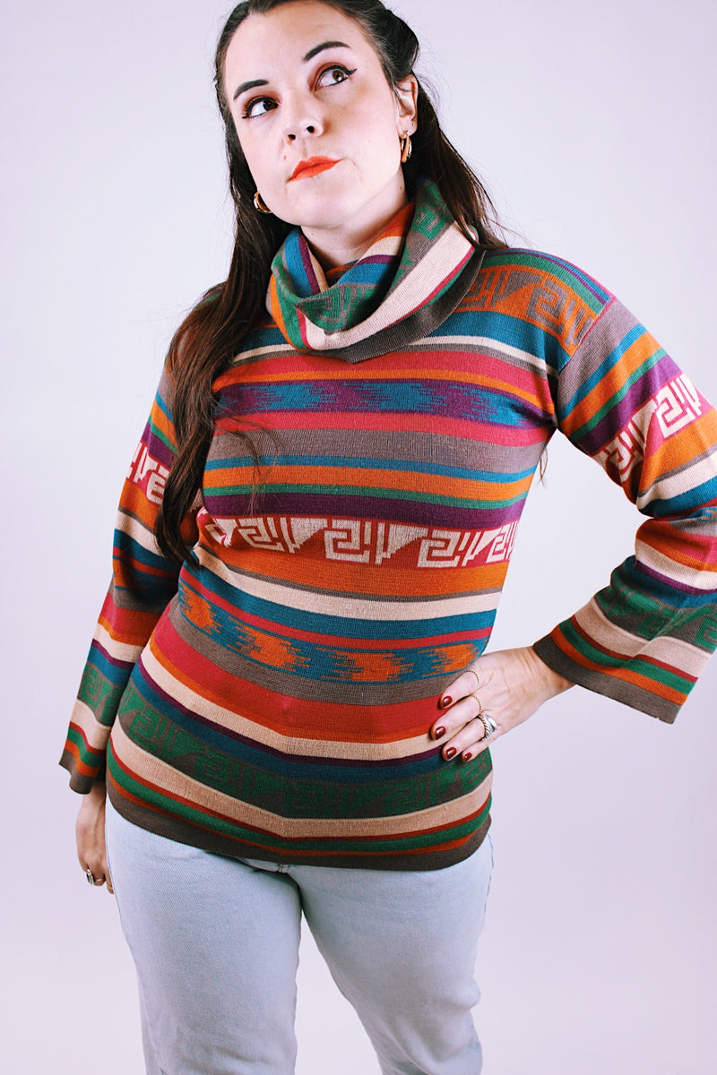 women's vintage long sleeve cowl neck sweater with multi colored stripes and print