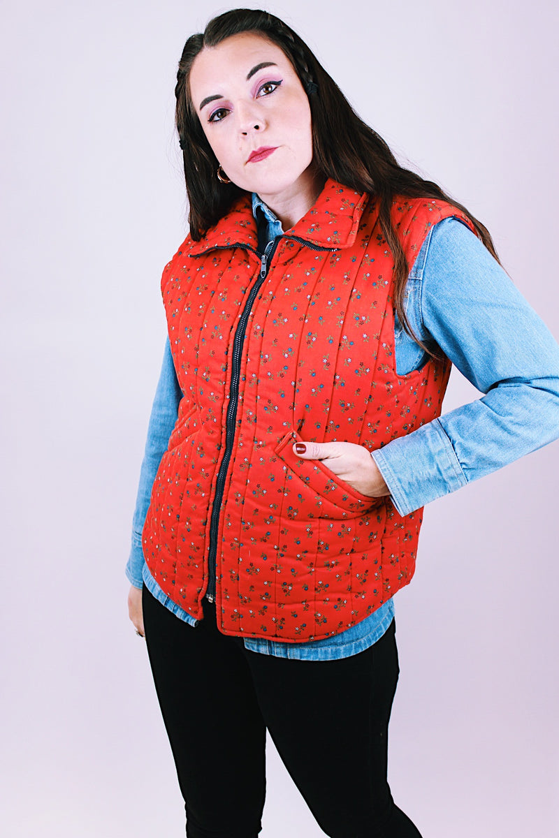 women's vintage red puffer quilted cotton vest with ditsy floral print zips up the front