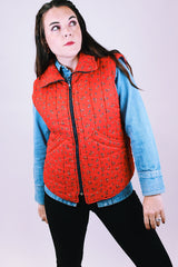 women's vintage red puffer quilted cotton vest with ditsy floral print zips up the front