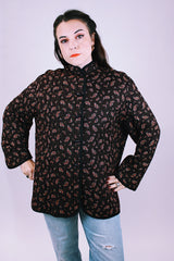 long sleeve women's vintage quilted jacket in brown with floral print and toggle buttons up the front