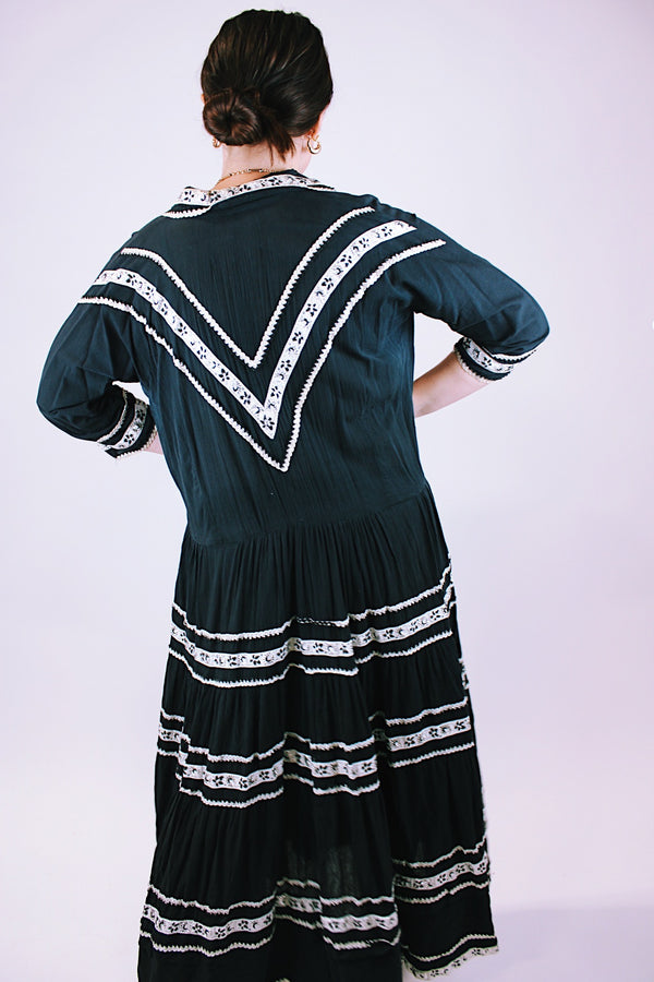 1950's vintage women's dress black with white and silver metallic ribbon applique throughout