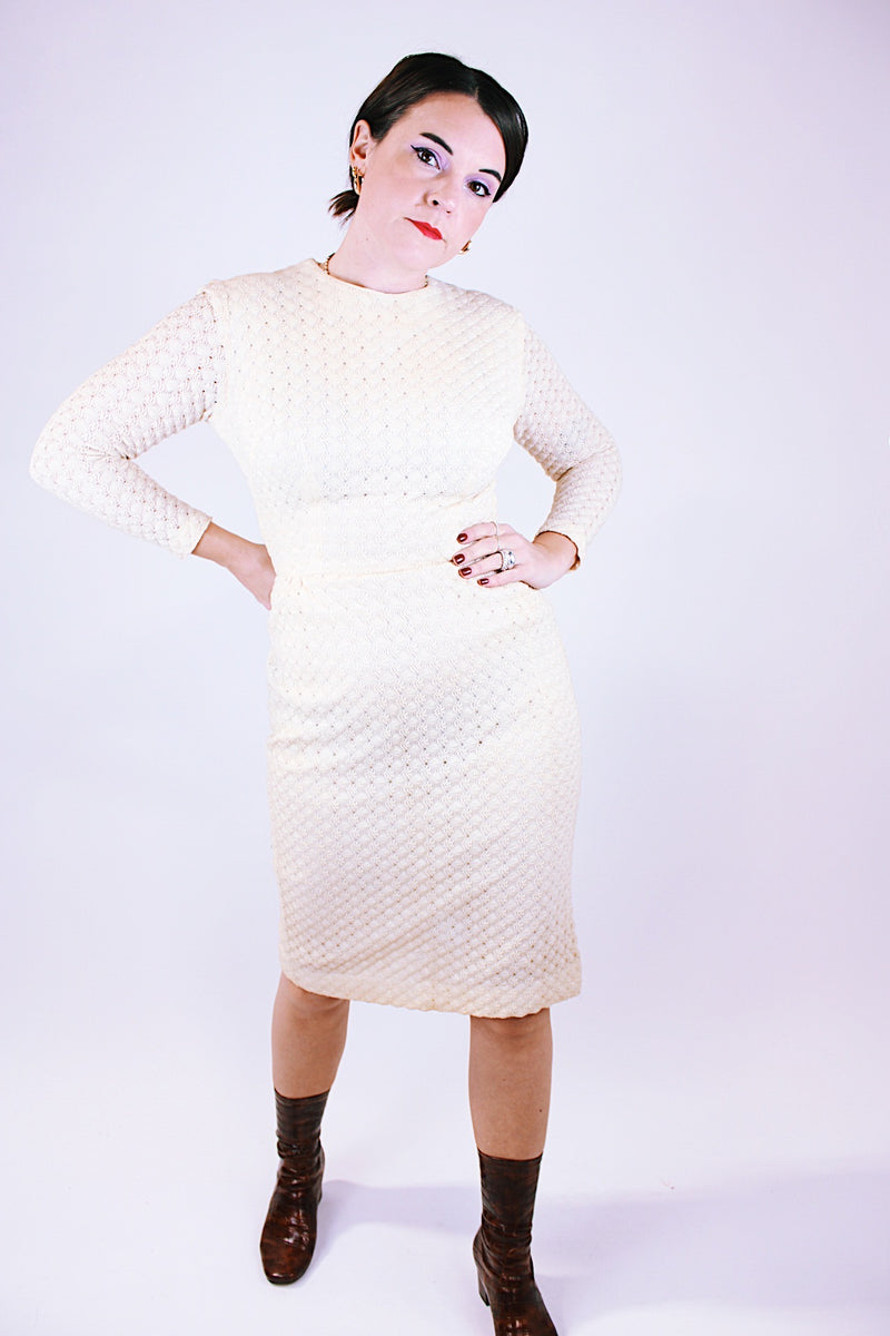 women's vintage 1960's cream crochet dress with long sleeves and midi length 