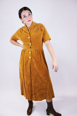 short sleeve women's vintage 1950's mustard yellow velvet dress midi length with collar and buttons in the front