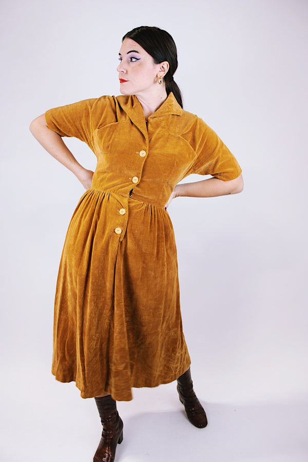 short sleeve women's vintage 1950's mustard yellow velvet dress midi length with collar and buttons in the front