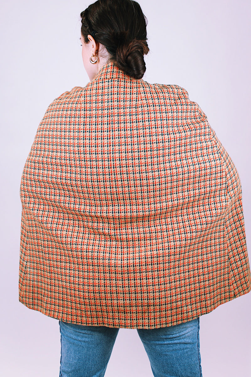 women's vintage tartan printed poncho in tan and red with buckle closure and mandarin collar 