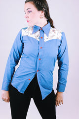 1970's women's vintage long sleeve button up blouse blue with collar and floral patchwork detail