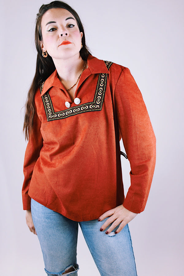 long sleeve pullover blouse in a soft faux suede burnt orange fabric with collar