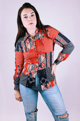 women's vintage 1970's long sleeve button up blouse in a navy and red patchwork print polyester