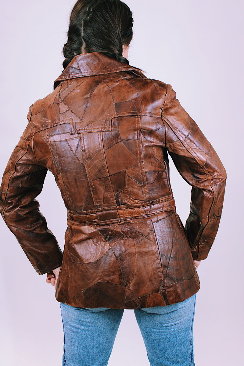 1970's brown leather patchwork jacket buttons up the front with collar and tie waist 