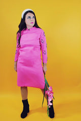 1960's vintage long sleeve midi dress in hot pink with sheer beaded arms and mock neck