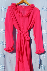long sleeve sheer hot pink midi dress with tie waist and ruffled neckline and cuffs vintage 1970's