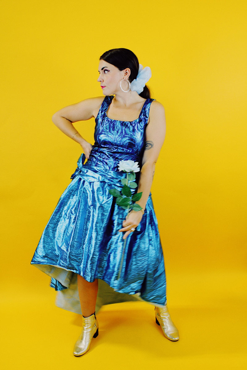 sleeveless blue metallic 80's prom dress with high low hem